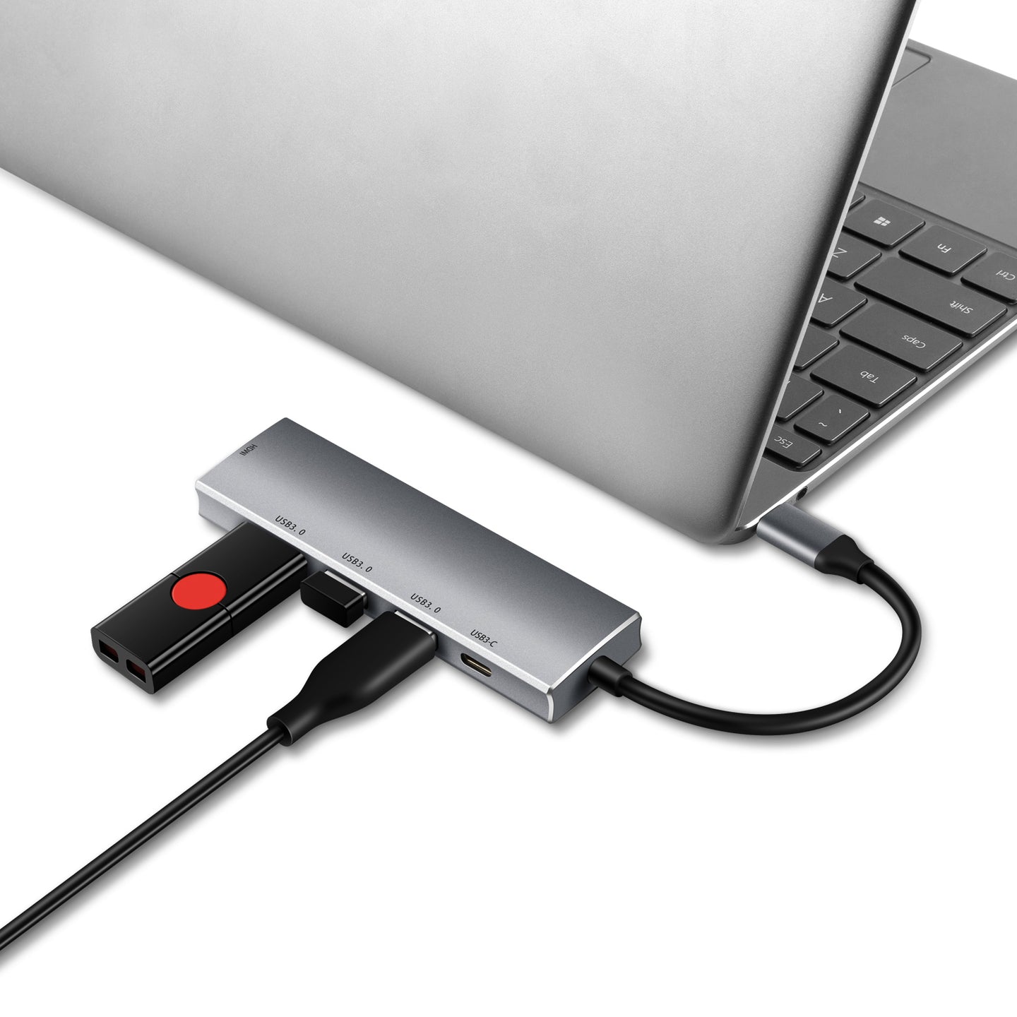 An image showing Type C to HDMI being connected to the laptop and connected to the peripheral devices