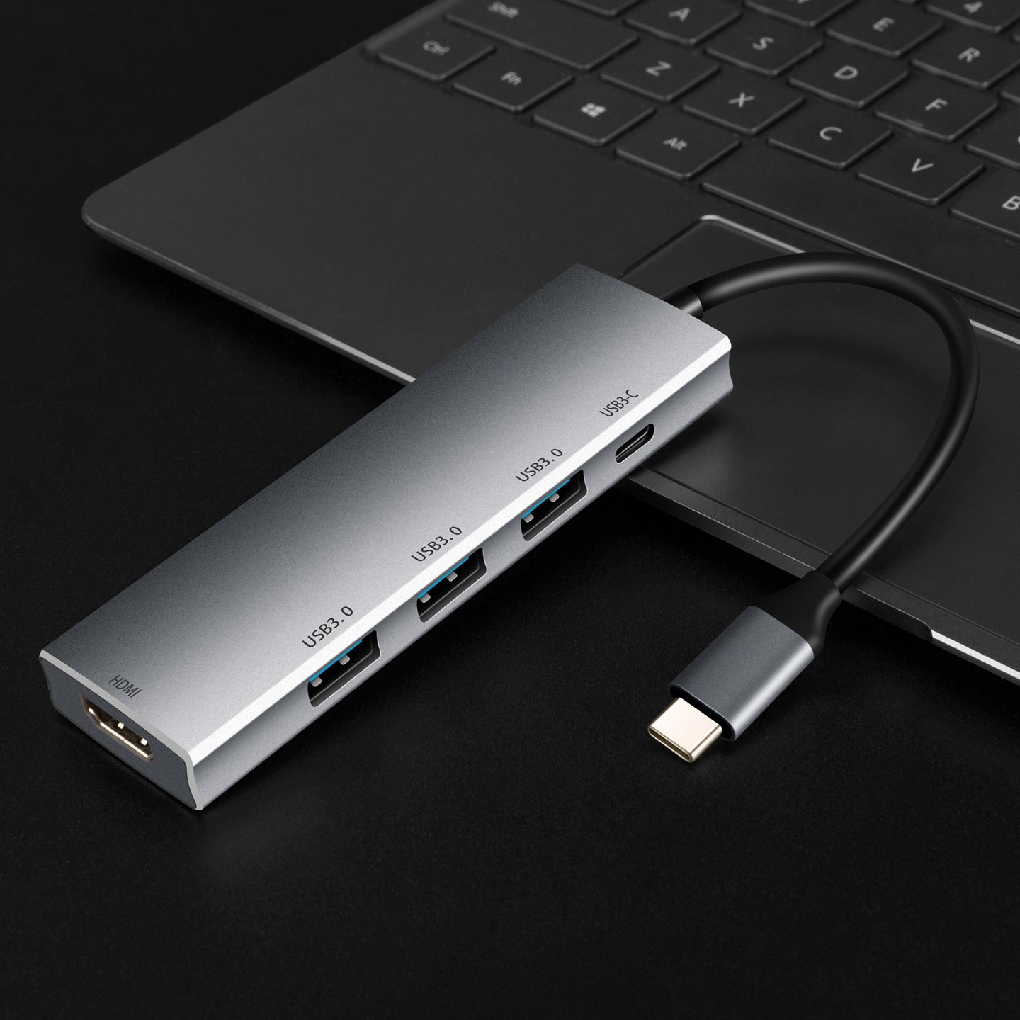 Close up view of Type C to HDMI placed on the laptop