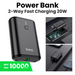 Close up view of power bank 20W 10000 MaH capacity with phones connected to powerbank via cable