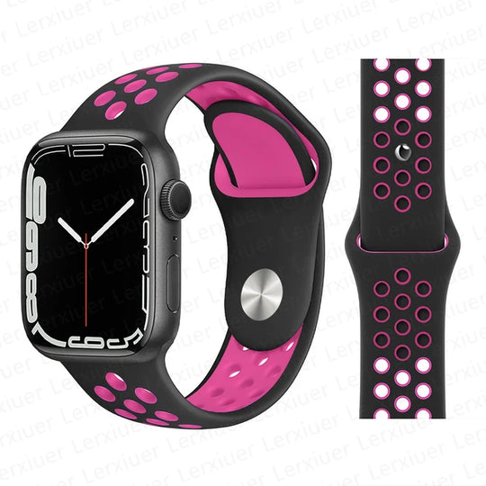 Close up view of Apple sports band  in black pink color connected to the watch