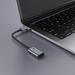 An image showing Type-C to HDMI Converter (HB21) being connected to Laptop using type-c connection

