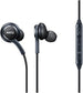 Close up view of AKG earphones together with volume button side by side