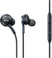 Close up view of AKG earphones together with volume button side by side