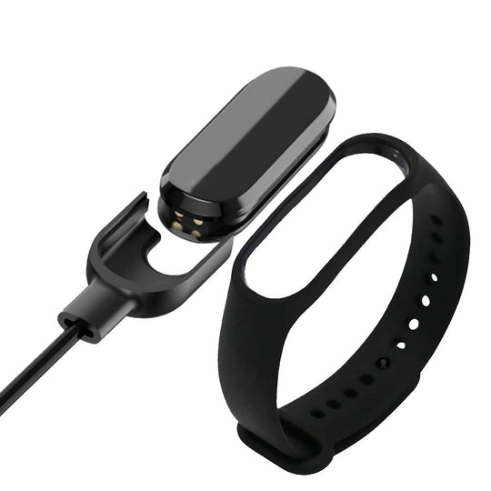 lose up view of Smart Band 6 removed from its watch band for charging

