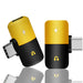 closeup view of type-c adapter with black and gold color design on it, engraved lightning and headphone icon on it